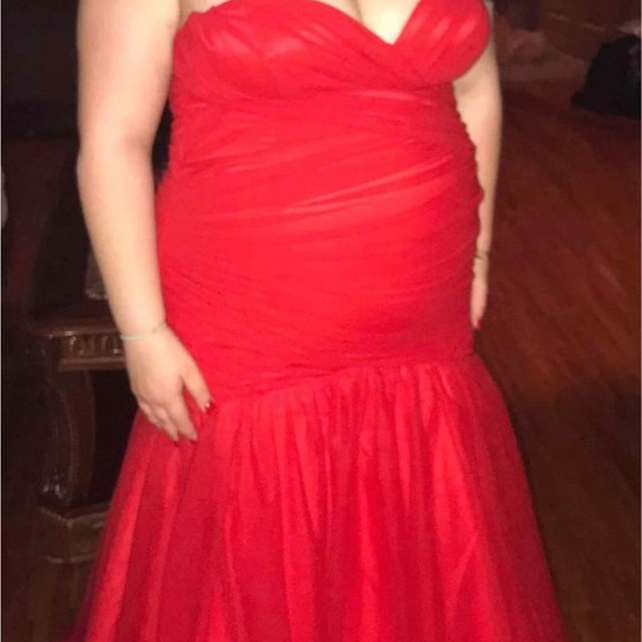 This gorgeous red prom dress is a size 20 but it definitely fits smaller. - Picture 2 of 4